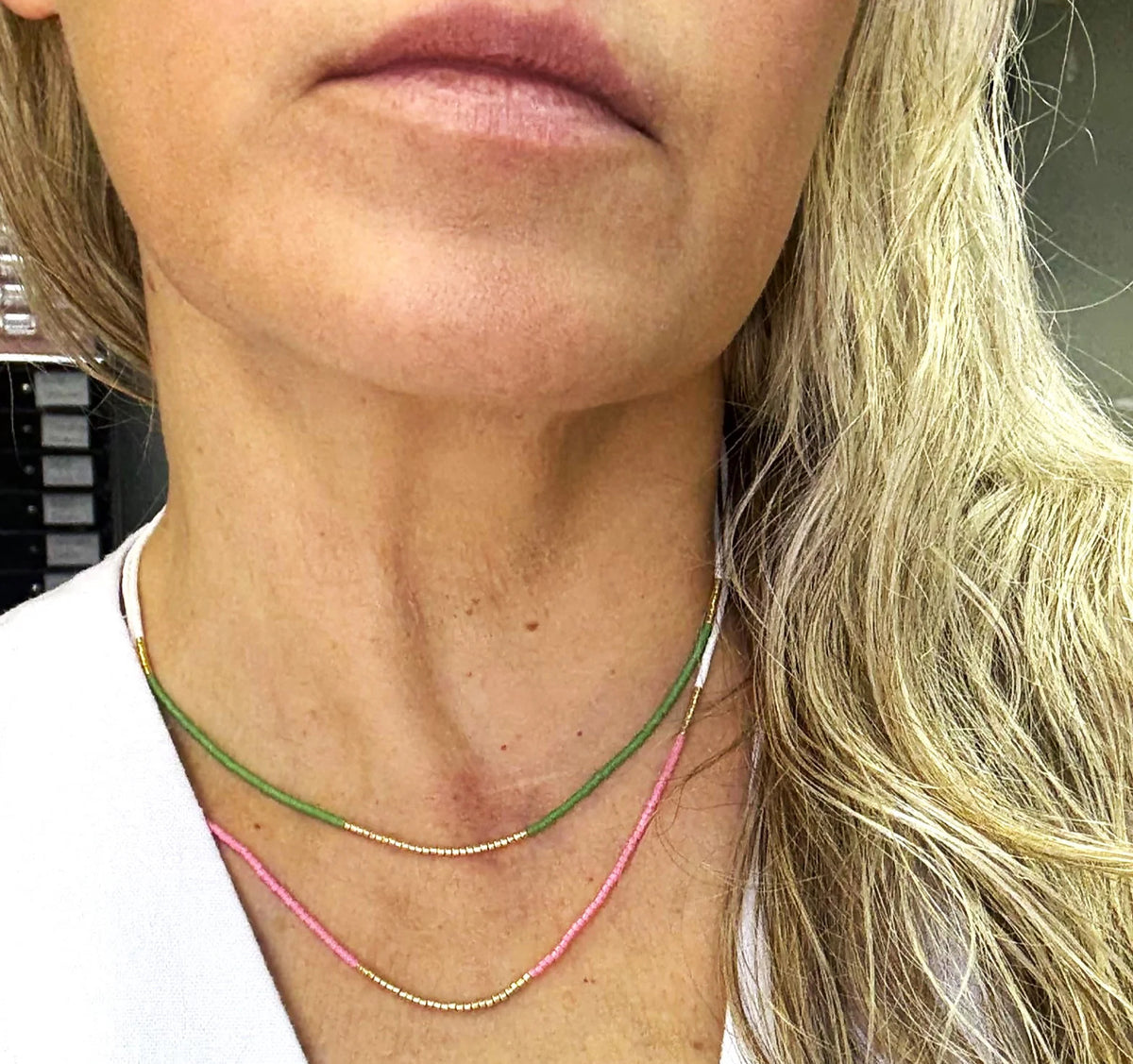 Pink necklace shown at 18 inches layered with gray necklace shown at 16 inches