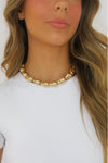 Indulge in our latest obsession: the Ariel Pearl Collar. This gorgeous and stylish accessory is a must-have for any fashion-forward individual. You will love the statement and sophistication this piece adds to your outfit!

16" round
synthetic pearl