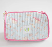 Showing pink shells on a light blue background 