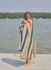 Showing the blanket wrapped on girl on dock 
