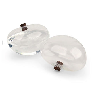 Keep your plants perfectly watered! Water From A Stone slowly lets water out into your planter over the course of 3-4 days. A useful addition to any gardener's home. Made from hand-blown glass. Holds 7oz (207ml) of water. Instructions are: 1. Remove the cork and fill the stone with clean water and replace the cork. 2. Turn over and test to make sure water is coming out of the water release hole. 3. Place the stone in your planter with the cork facing down. 4. Make sure the stone is placed on a level surface
