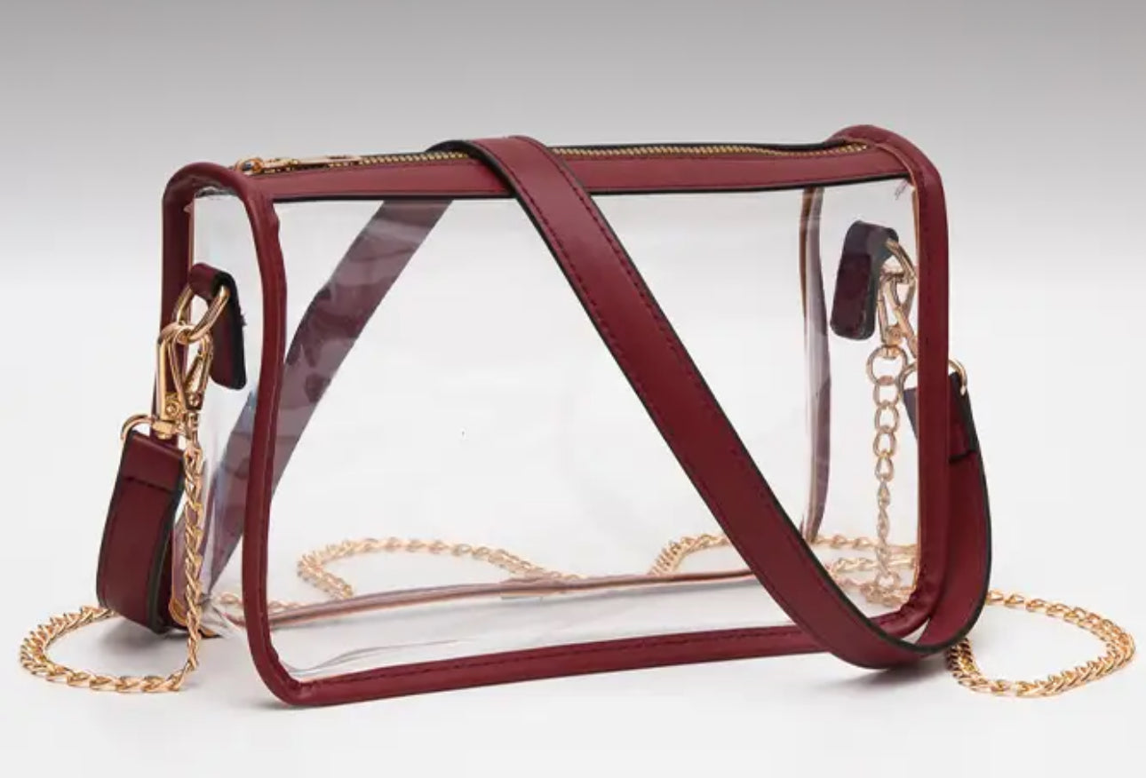 Showing brown clear red table bag with brown strap or gold chain as an option 