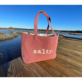 This top selling bag is perfect for days on the beach, boat or running errands.  

Durable cotton canvas bag imprinted with the words, "SALTY". Thick & cushioned 12" Shoulder length handles

Nantucket red shown