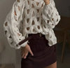Paired with brown leather mini skirt