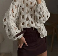 Paired with brown leather mini skirt