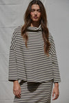 This oversized turtleneck was willing right out of the box. We love it with the matching skirt or your favorite pair of denim.  


hand wash 

cotton/rayon blend 