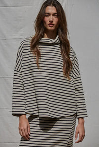 This oversized turtleneck was willing right out of the box. We love it with the matching skirt or your favorite pair of denim.  


hand wash 

cotton/rayon blend 