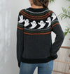 Showing back of sweater with all over pattern 