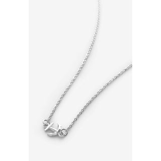 Silver necklace shown laying on white background 