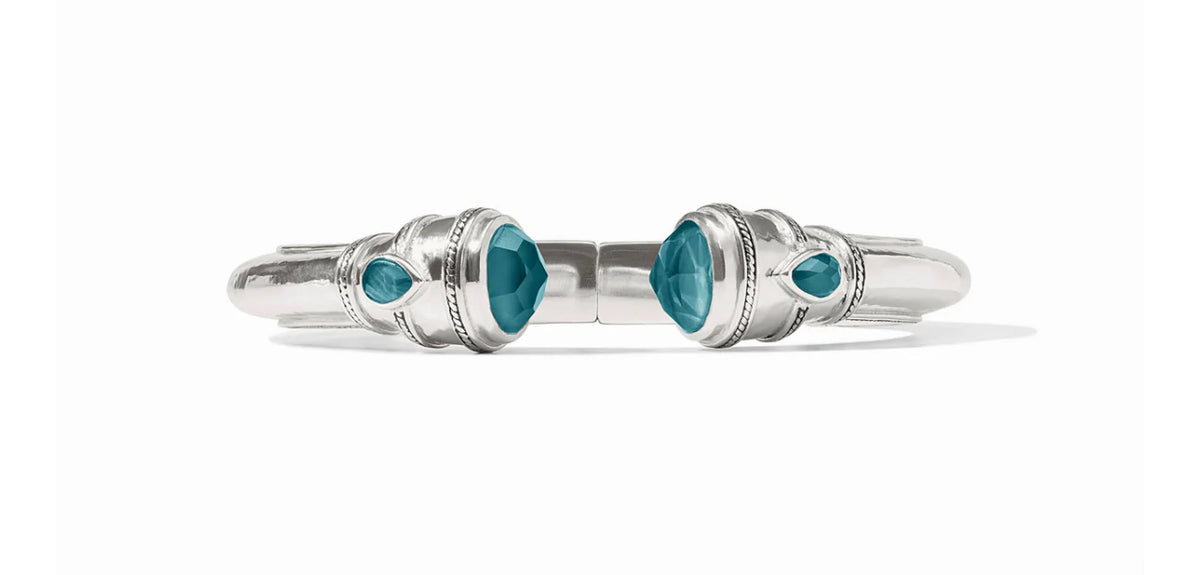 Pure silver plate (tarnish-free), imported glass
Inner circumference: 6.8 inches (small), 7.1 inches (medium)
Width: 0.5 inches
Closes with spring hinge
Julie Vos hallmark