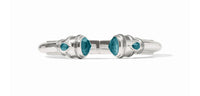 Pure silver plate (tarnish-free), imported glass
Inner circumference: 6.8 inches (small), 7.1 inches (medium)
Width: 0.5 inches
Closes with spring hinge
Julie Vos hallmark