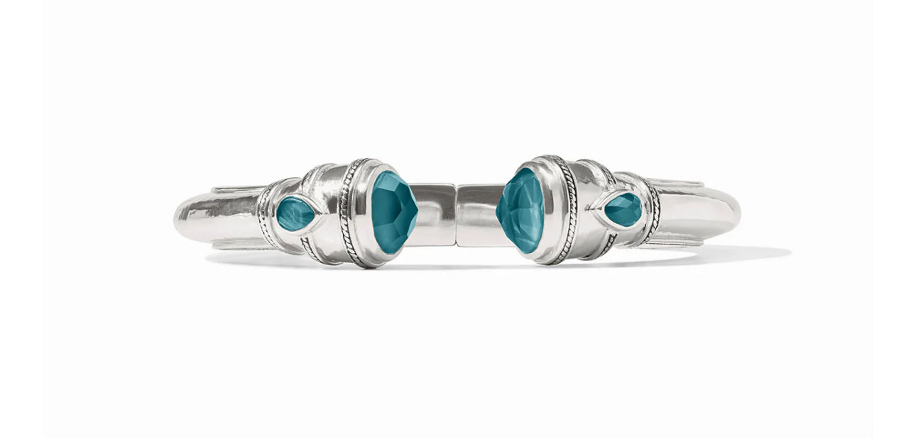 Pure silver plate (tarnish-free), imported glass
Inner circumference: 6.8 inches (small), 7.1 inches (medium)
Width: 0.5 inches
Closes with spring hinge
Julie Vos hallmark