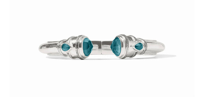 Pure silver plate (tarnish-free), imported glass
Inner circumference: 6.8 inches (small), 7.1 inches (medium)
Width: 0.5 inches
Closes with spring hinge
Julie Vos hallmark