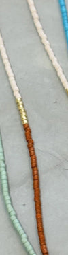 Right necklace shown