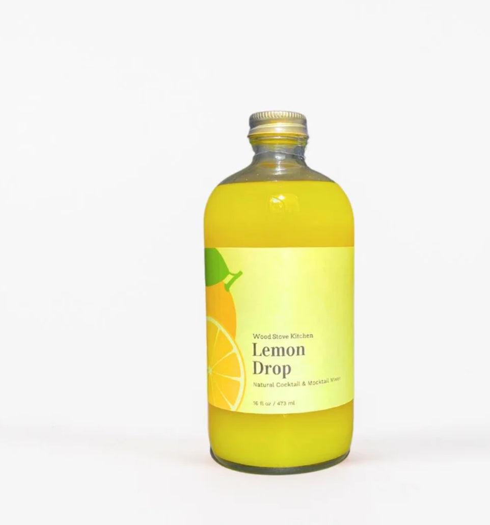 
This mixer is packed with sweet and tart lemons. It is perfect for mixing with vodka for a Lemon Drop Martini or for adding to seltzer along with a shot of rum, vodka, tequila, or gin. Our Lemon Drop Mixer is potent and delicious, and its bright yellow color will delight your guests.

Each bottle makes 12+ drinks -- often much more. The bottle is made of glass, and the caps are gold metal