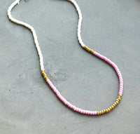 Pink, white and gold necklace
Made in USA master friendly 