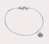 Add to your original design collection of the Cape Cod Jewelry®️ with a sterling silver bangle and double  ball available in sterling silver, 14k yellow gold. Silver shown 
