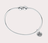 Add to your original design collection of the Cape Cod Jewelry®️ with a sterling silver bangle and double  ball available in sterling silver, 14k yellow gold. Silver shown 