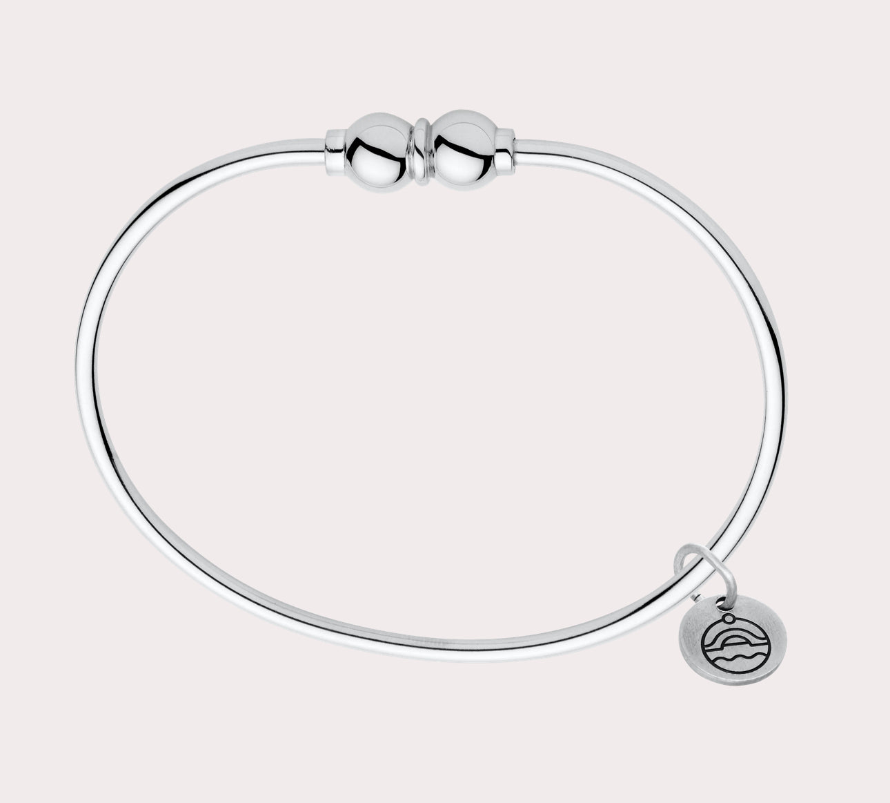 Add to your original design collection of the Cape Cod Jewelry®️ with a sterling silver bangle and double  ball available in sterling silver, 14k yellow gold. Silver shown 