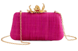 Pink clutch bag with gold chain and decorative clasp on a white background